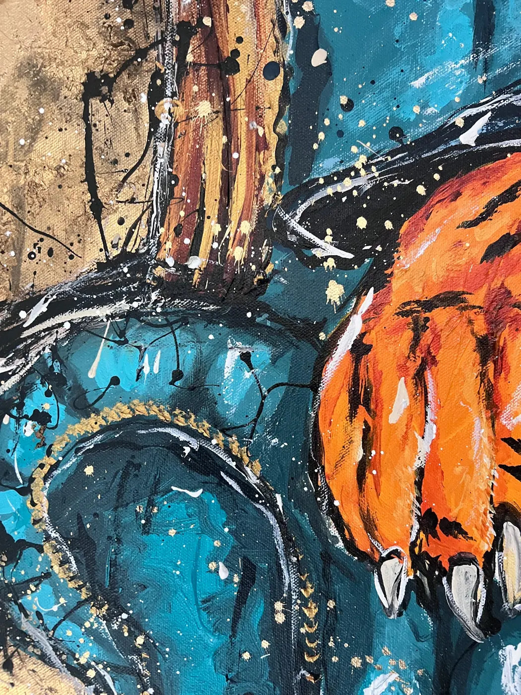 Detail of the turquoise sofa, tiger’s paw and splattered gold-leaf background in Tie Grrr Luxe II.